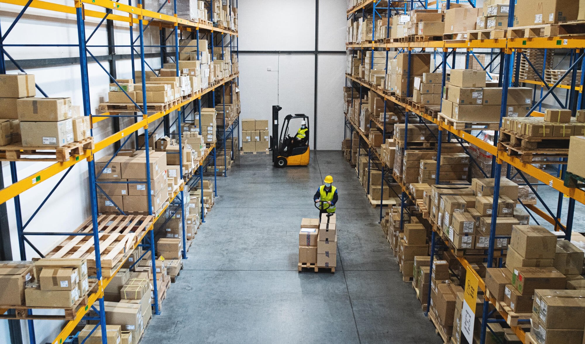 Men-workers-with-forklift-and